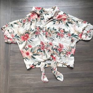 Cropped shirt that ties at the waist.